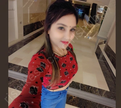 Rishikesh call girl wearing red top and taking selfie